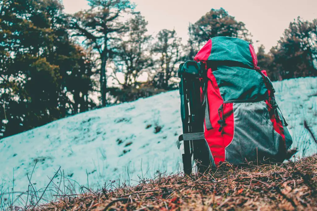 Essential Gear for Mountain Trekking in Tanzania: What to Pack for Your Adventure 6 Gray and Red Hiking Backpack