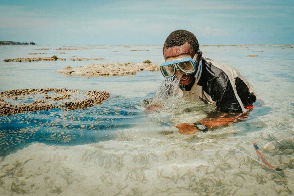 Zanzibar Snorkeling and Safari Packages | Dive into Tanzania’s Best 1 Man Posing in Diving Goggles