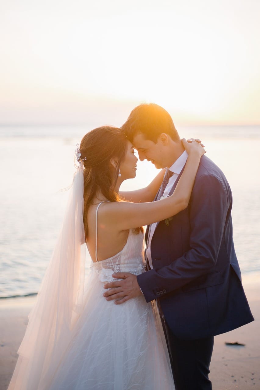How to plan a beach wedding in Zanzibar 1 sunset, couple, wedding