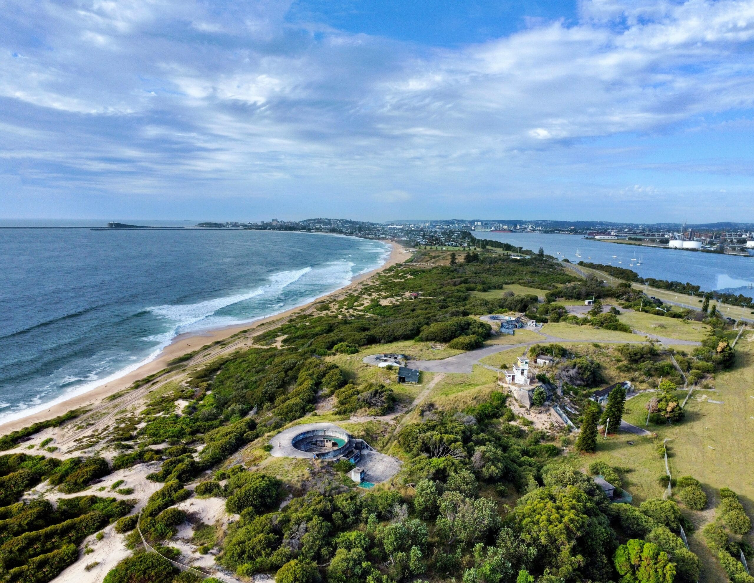 Breathtaking aerial view of Stockton Beach coastline and greenery in NSW, Australia.