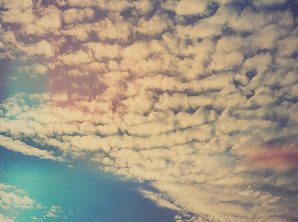 Weather patterns in Zanzibar throughout the year 1 A vibrant image showcasing pastel-tinted cirrocumulus clouds across a serene sky.