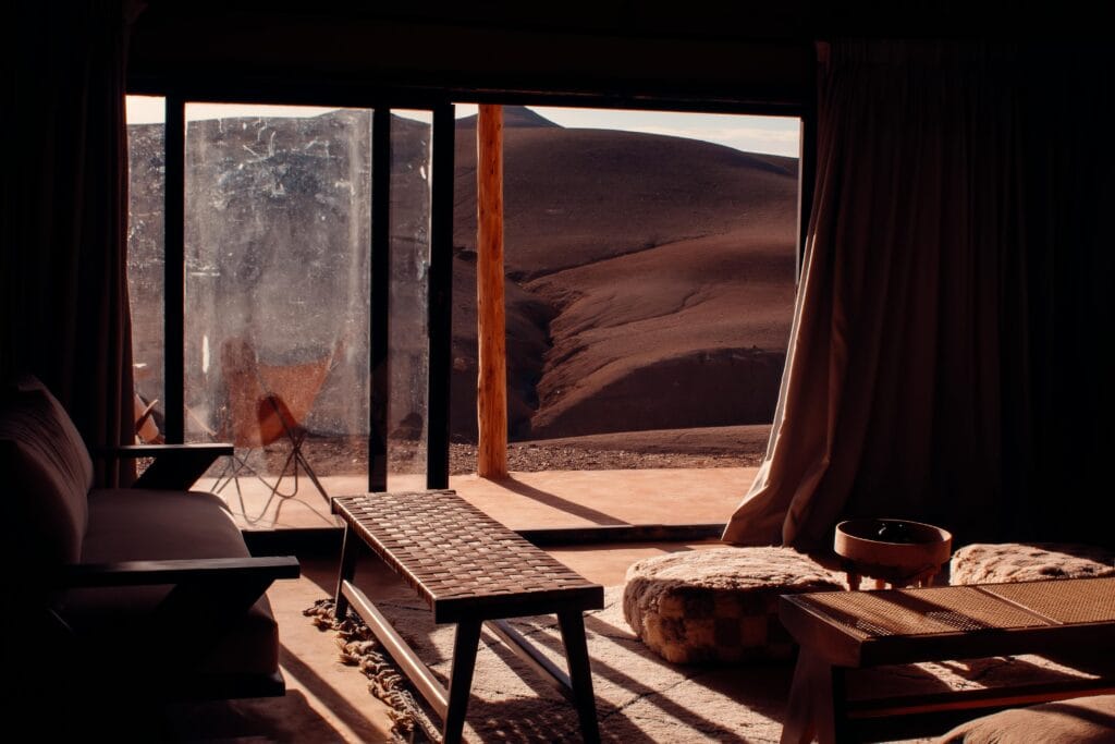 Are Luxury Safaris Worth It? 19 Elegant interior with desert view in Agafay, Morocco. Perfect blend of nature and luxury.