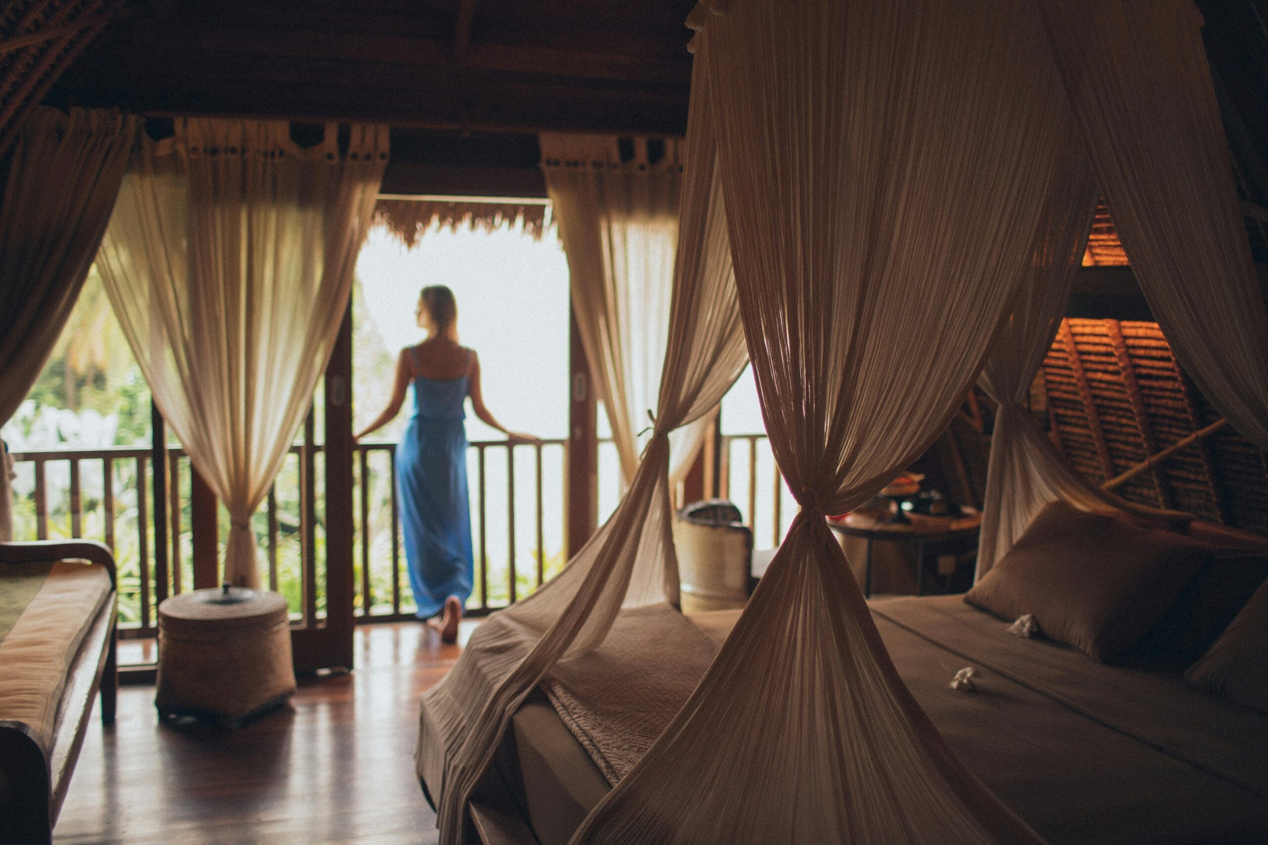Tips for Comfortable Safari Travel: Make the Most of Your Adventure 1 Peaceful bedroom in tropical villa with balcony view, perfect for relaxation.