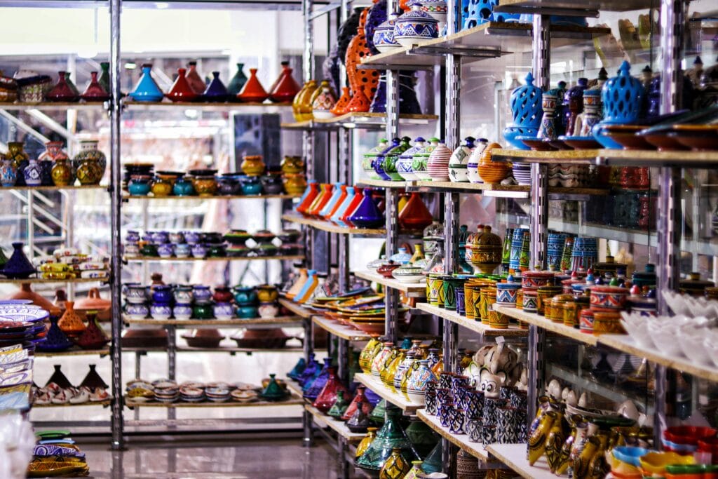 Shopping for Local Crafts in Zanzibar: Where to Find Unique Souvenirs 8 Explore vibrant Moroccan ceramics beautifully displayed in a traditional market setting.