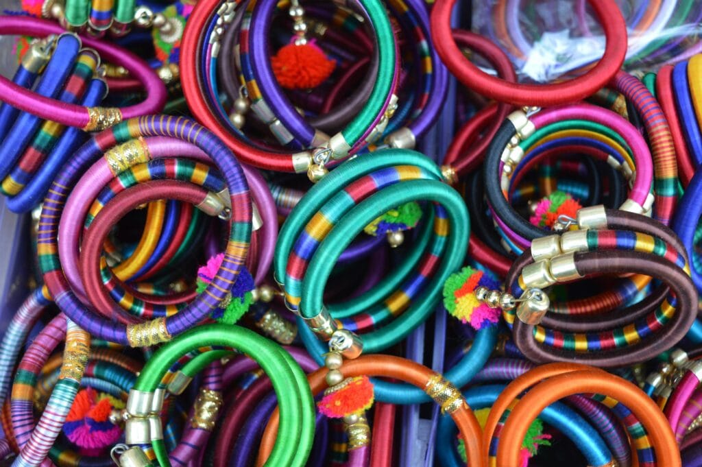 Best Souvenirs to Bring from Tanzania: A Guide to Authentic Treasures 5 Colorful Rajasthani bangles on display in Jaipur market showcases traditional Indian craftsmanship.